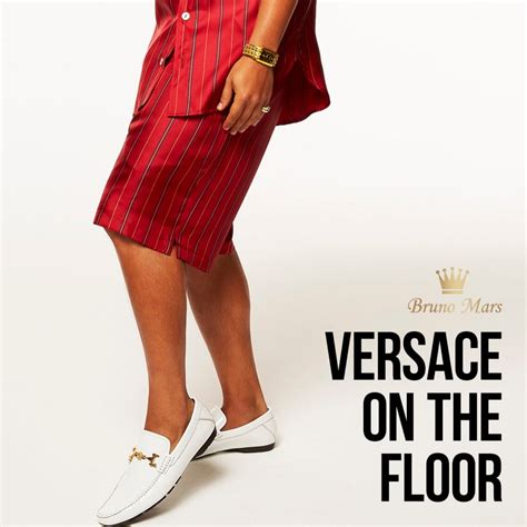 bruno versace on the floor.